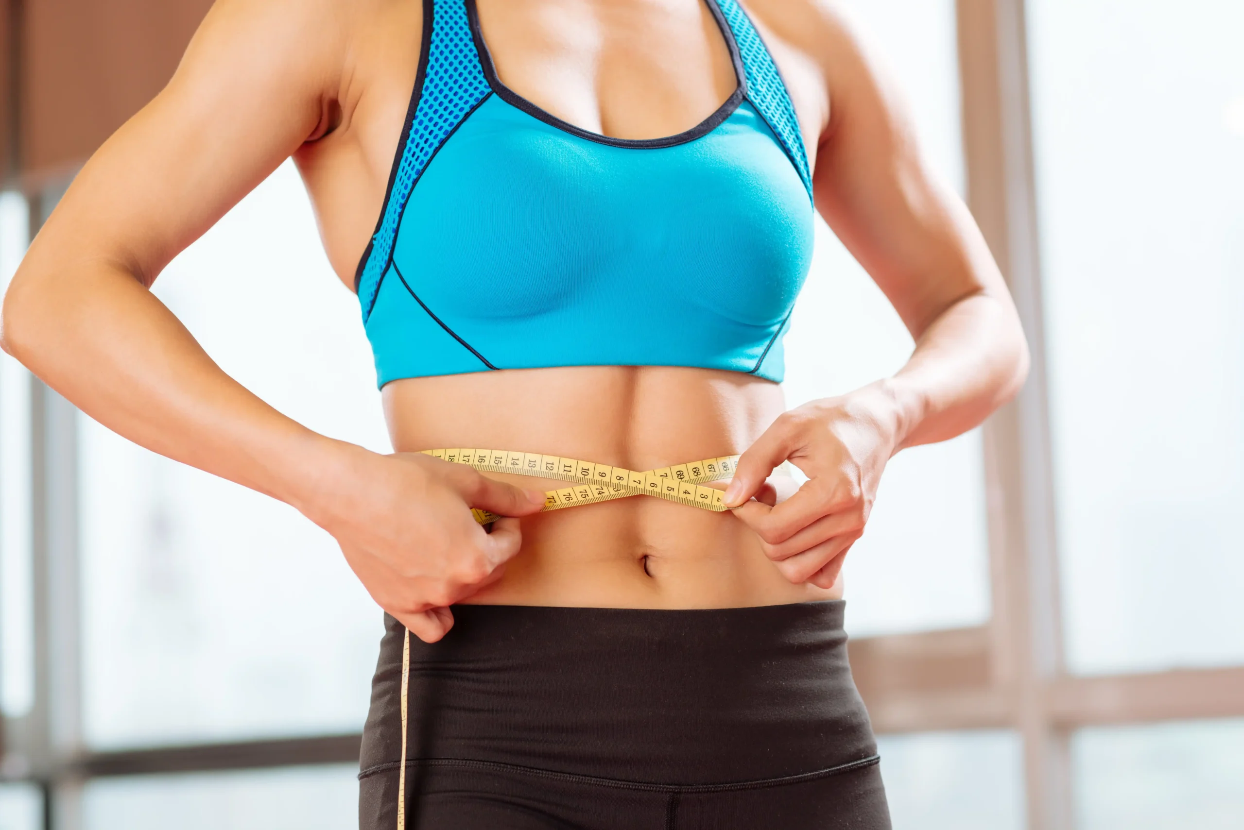 fit woman measures waist with tape measure 2026 01 08 00 09 57 utc 11zon fit woman measures waist with tape measure 2026 01 08 00 09 57 utc 11zon